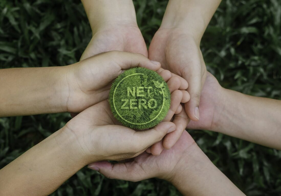 in hand holding green earth net zero concept natural environment Climate neutral long-term strategy Reduce CO2 emissions for the environment Global warming Sustainable development and green business from renewable energy